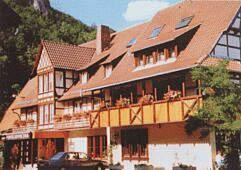 
a large building with a large window on top of it at Hotel Garni Forellenfischer in Blaubeuren
