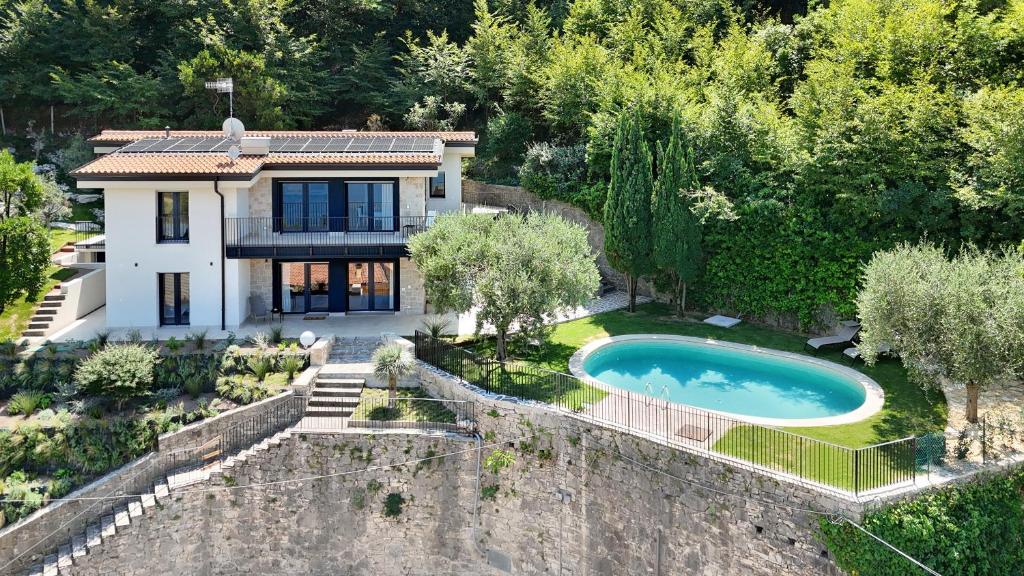 an aerial view of a house with a swimming pool at Villa aMA with Pool in Pai