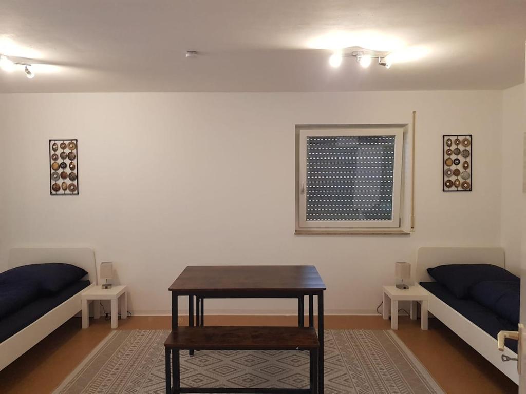 Ruang duduk di 4-Zimmer Monteurwohnung in Calw - L8