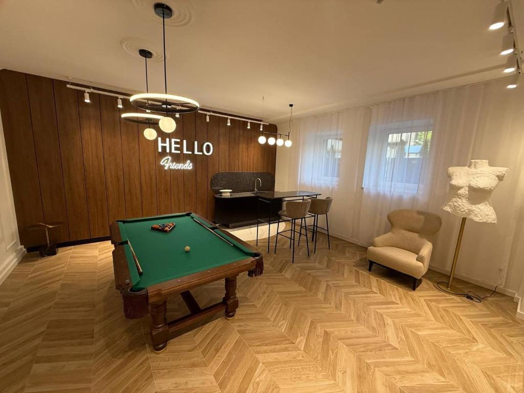 a room with a pool table and a table at Skyline LuxurySPA in Wrocław