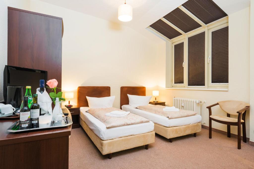 Posezení v ubytování Upper Room Hotel Kurfürstendamm
