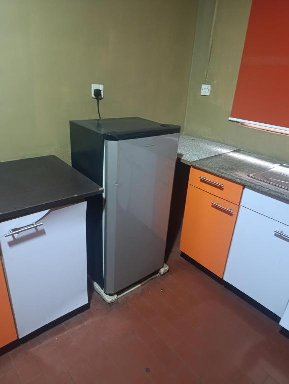 Η κουζίνα ή μικρή κουζίνα στο Family Home in Gbagada