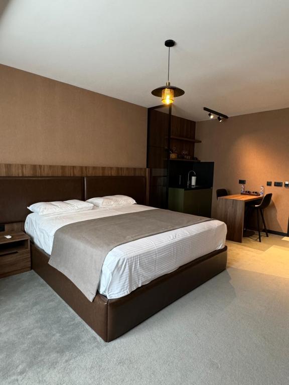 Ένα ή περισσότερα κρεβάτια σε δωμάτιο στο Five Apartments