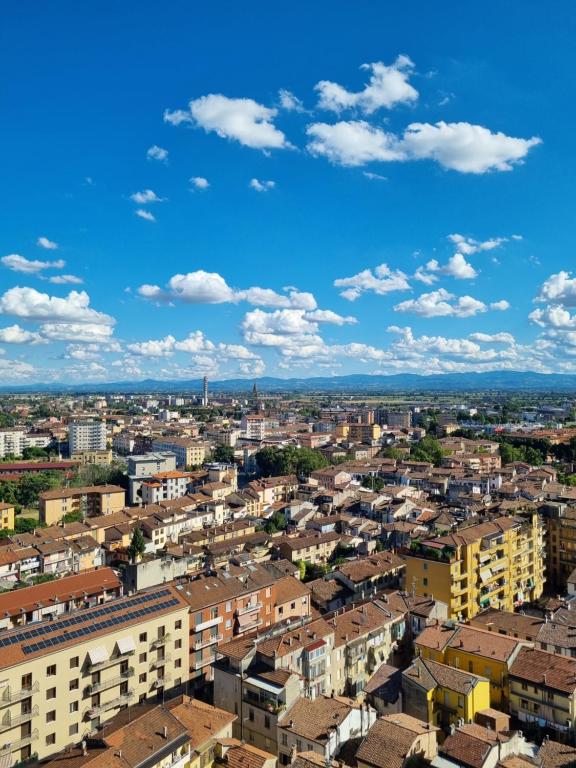 an aerial view of a city with buildings at Suite Mille in Piacenza