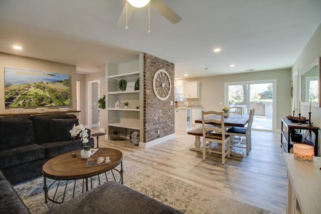 a living room with a couch and a table at Low Country Get Away 3 bed 2 bath Home in Bluffton