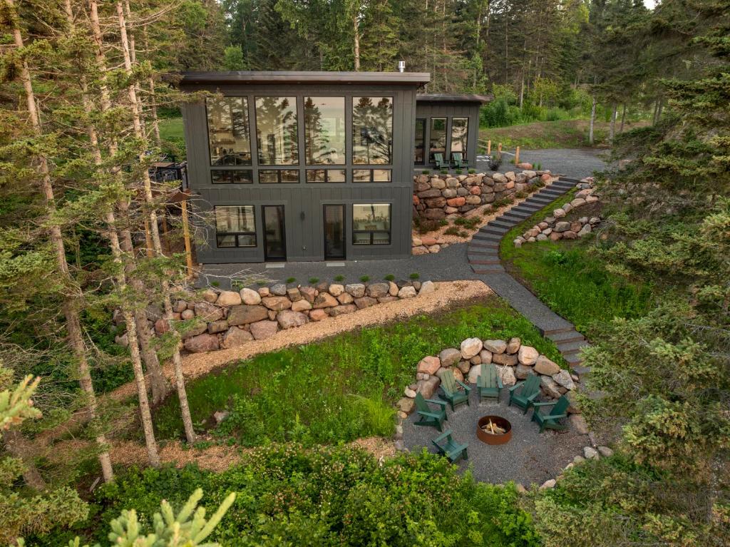 an aerial view of a house with a garden at Tallens Stuga Luxury Cabin of the Pines in Lutsen