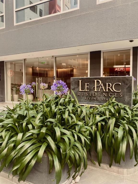 a bunch of plants in front of a store at Luxury Apartment Leparc Residences in Quito