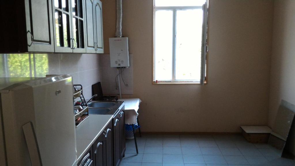 Kuchyň nebo kuchyňský kout v ubytování Lemon Family GuestHouse