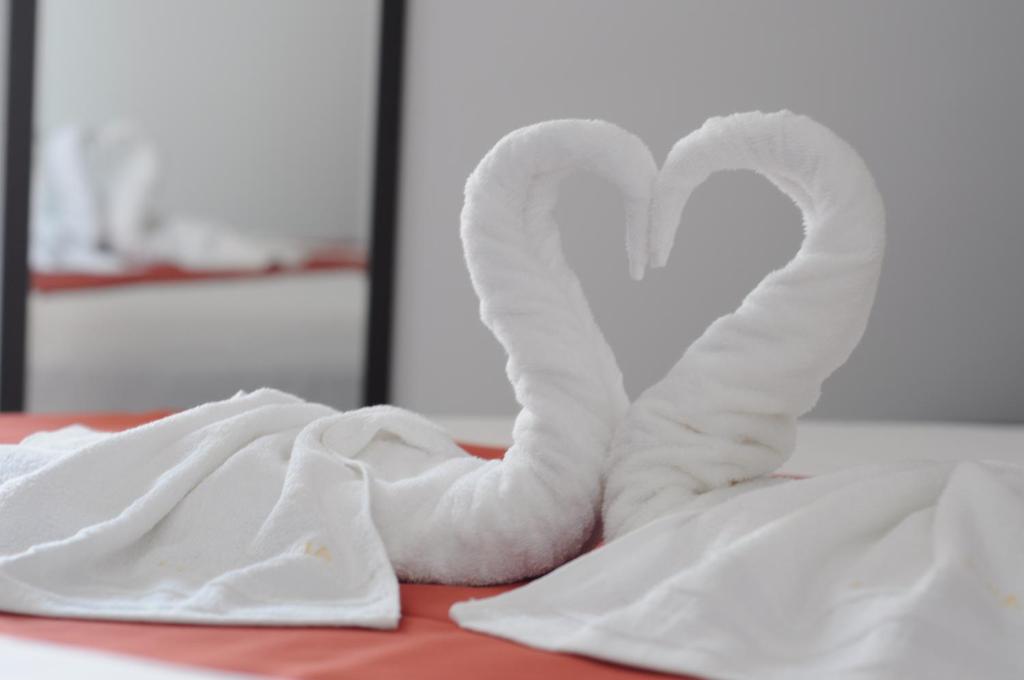 Postel nebo postele na pokoji v ubytování Hotel Evia
