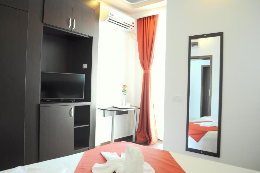 Postel nebo postele na pokoji v ubytování Hotel Evia