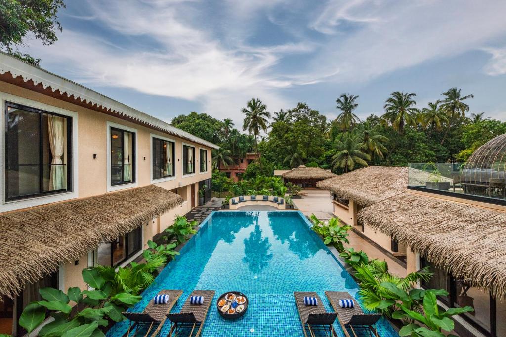 Πισίνα στο ή κοντά στο SaffronStays Frangipani