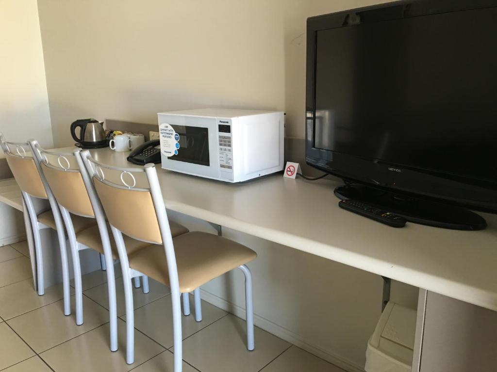 Kuchyň nebo kuchyňský kout v ubytování Blackwater Motor Inn