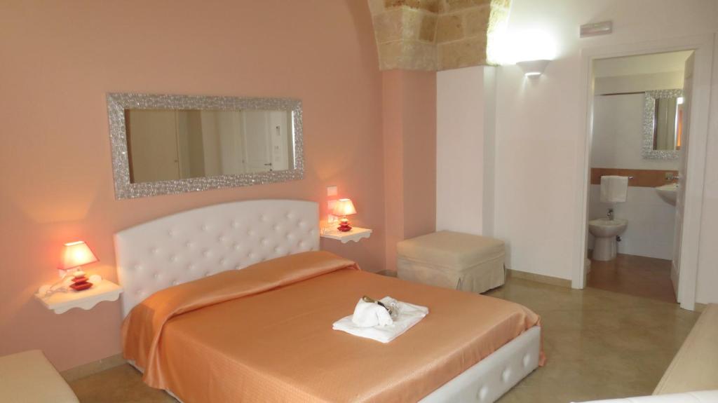 Postel nebo postele na pokoji v ubytování Antico Casale B&B