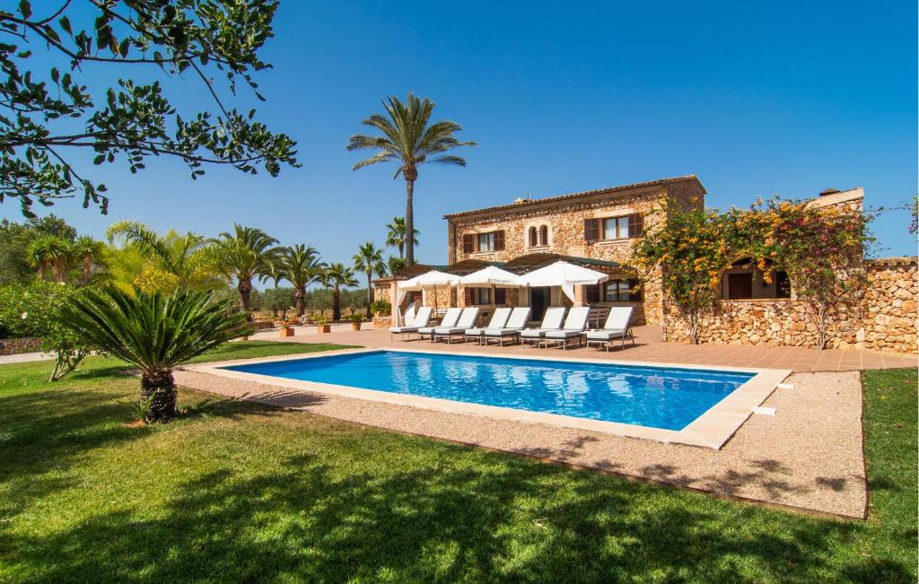 an image of a villa with a swimming pool at Can Sanchez in Campos