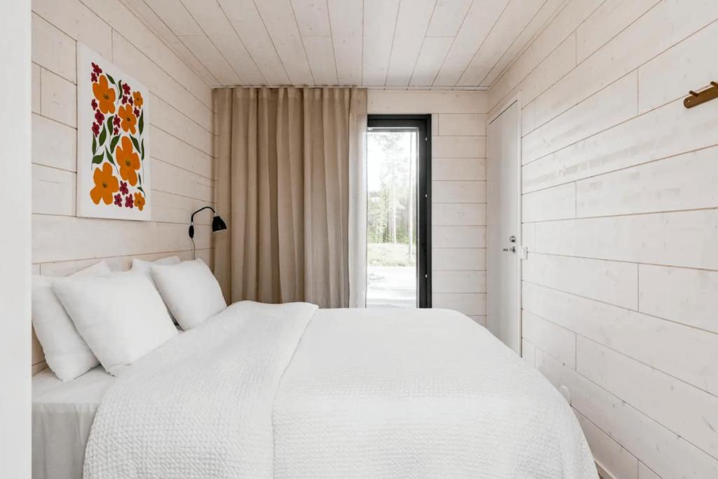 Giường trong phòng chung tại Riekko Lodge