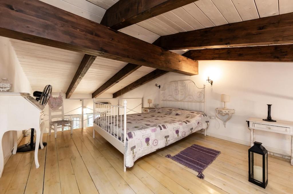 Ένα ή περισσότερα κρεβάτια σε δωμάτιο στο Charming Home - 25 minutes da Rome