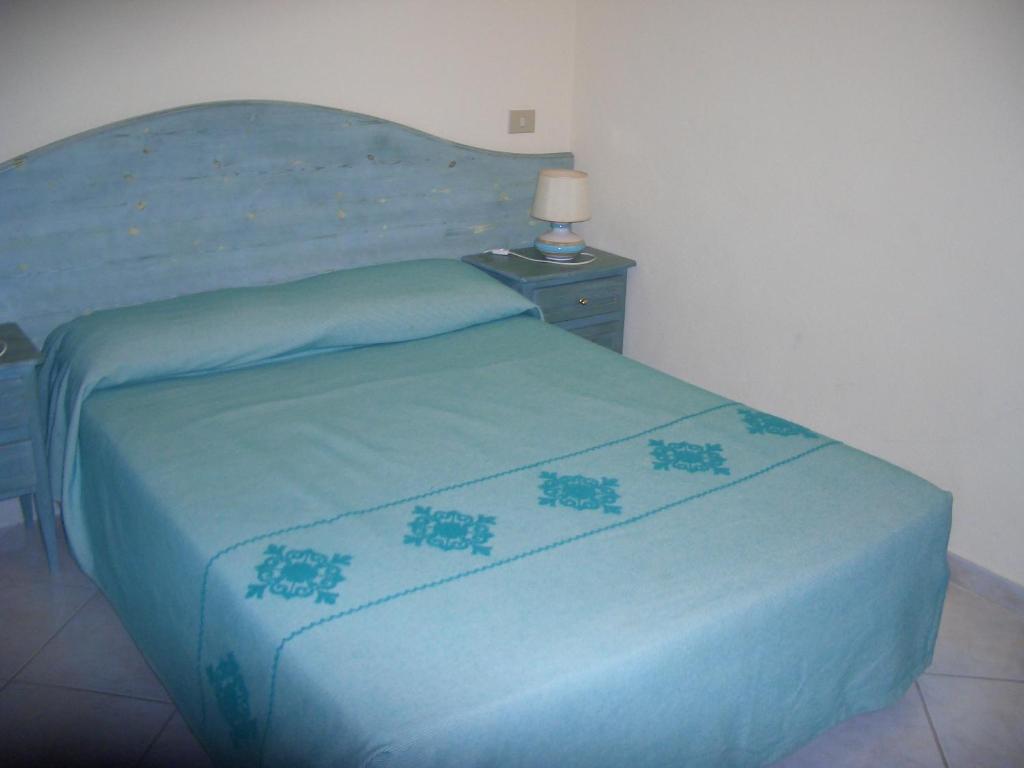 Postel nebo postele na pokoji v ubytování Residence Marina Palace