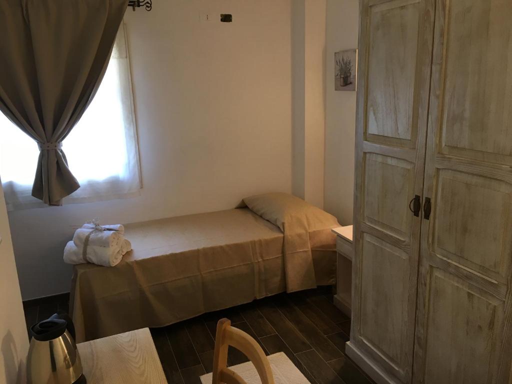 Postel nebo postele na pokoji v ubytování Monti di Jogliu