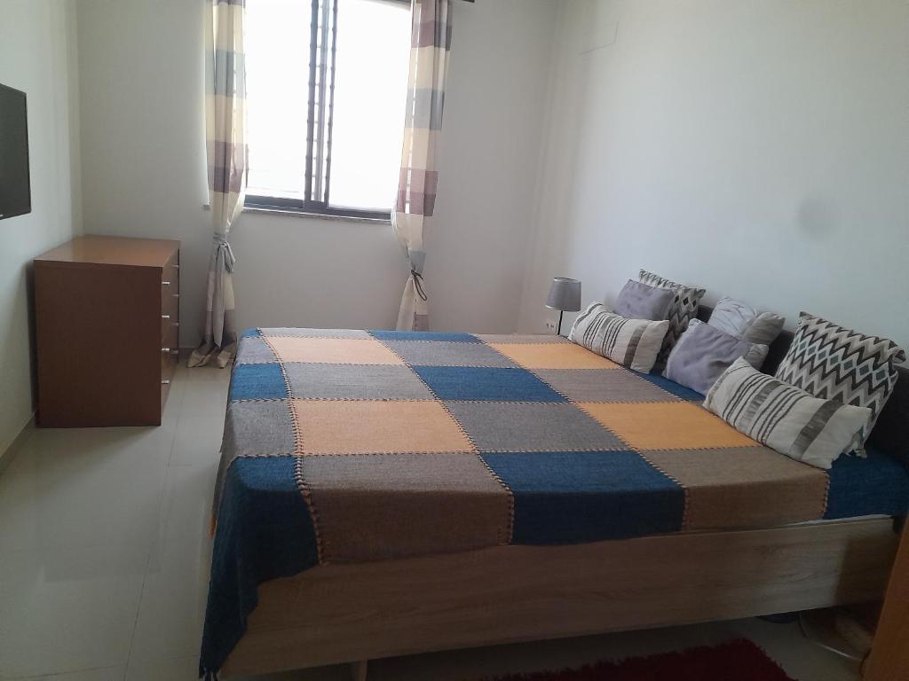 Postel nebo postele na pokoji v ubytování Conforto