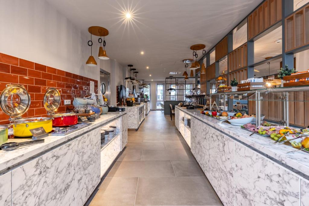 Holiday Inn - the niu, Pax Berlin Airport by IHG - Resim 29