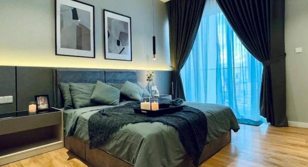 Postel nebo postele na pokoji v ubytování QUILL RESIDENCE KUALA LUMPUR CITY By AZMILA EMPIRE