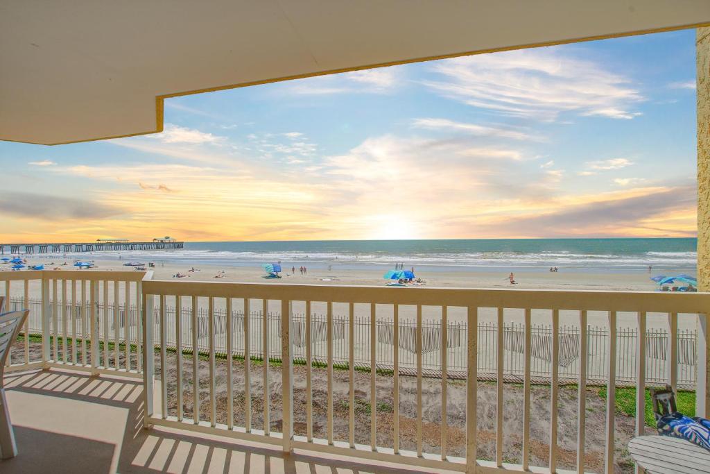 a balcony with a view of the beach at Charleston Oceanfront Villas 112 in Folly Beach
