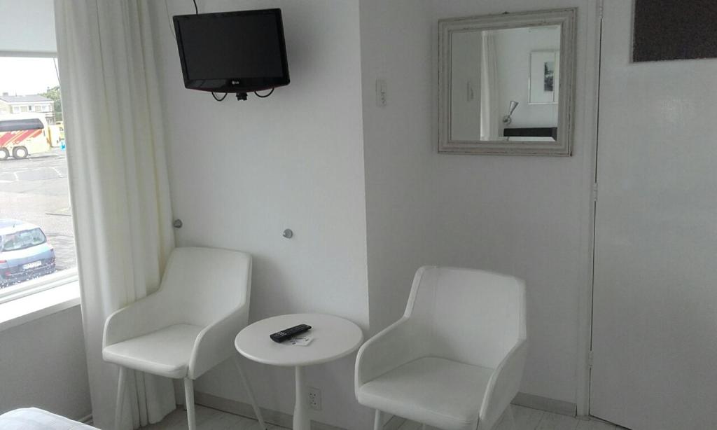 Pension 't hofje 350 meter van het strand - Housity