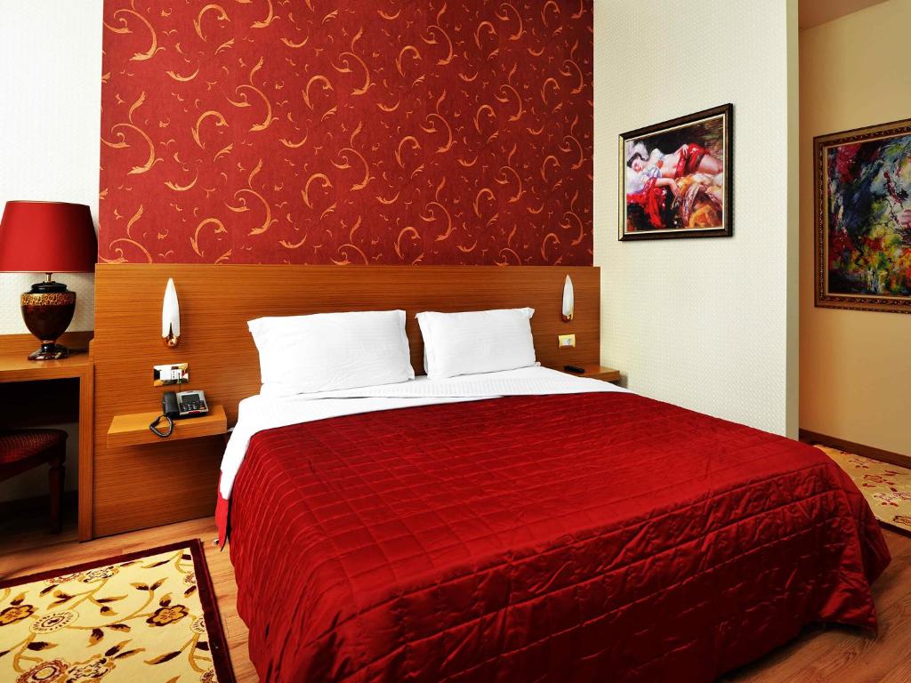 Postel nebo postele na pokoji v ubytování Hotel Austria