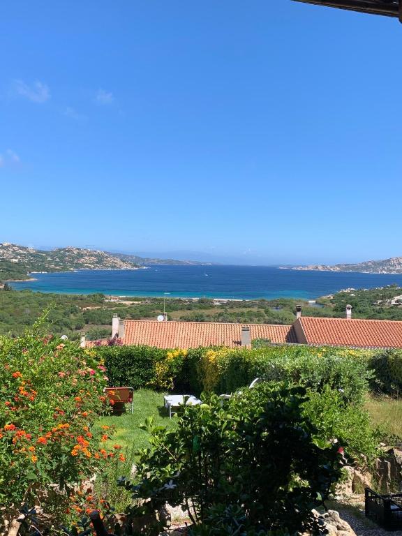 a view of the ocean from a house at Ginevra SurfHouse in Palau