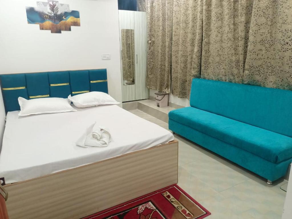 Postel nebo postele na pokoji v ubytování Sweet Home Lodge