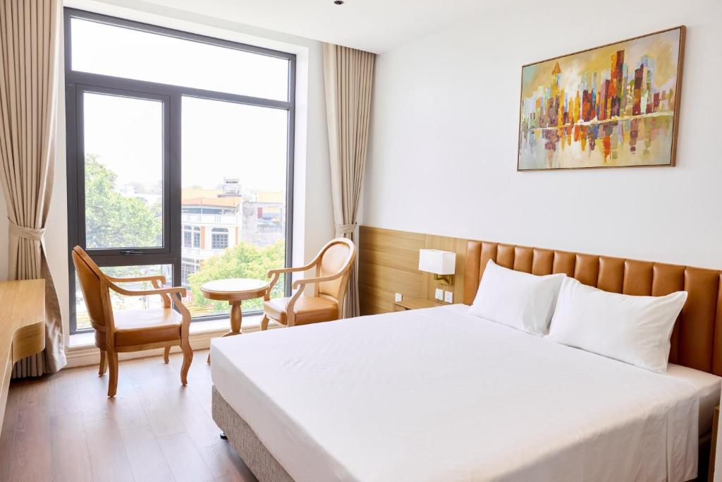 An Phát Luxury Hotel - Deluxe Room (2 Adults + 1 Child)