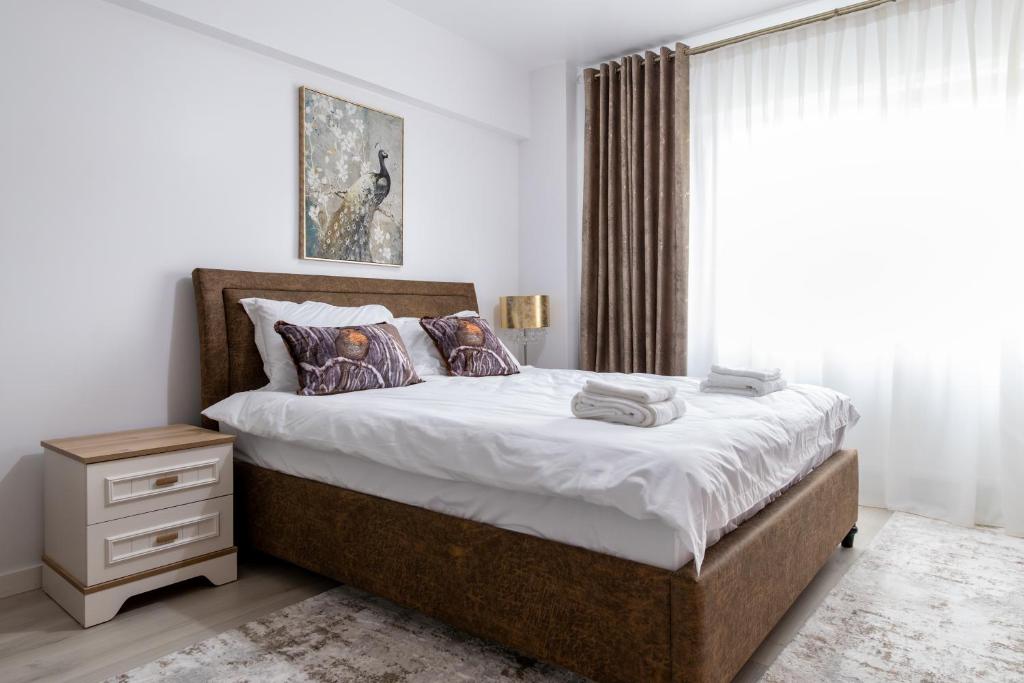 Postel nebo postele na pokoji v ubytování Colours Studios