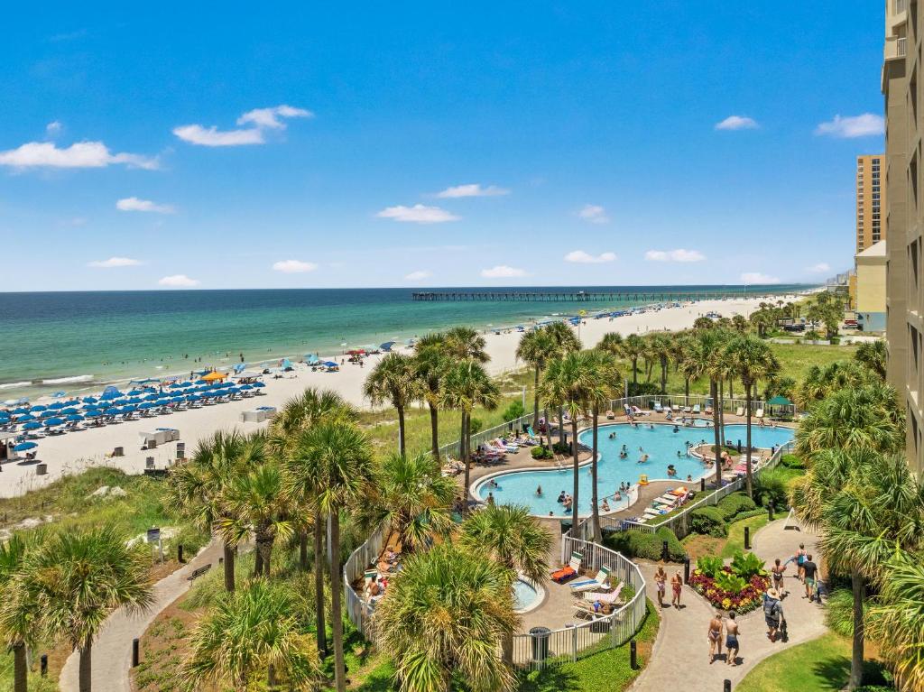 a view of the beach from the balcony of a resort at Grand Panama by Panhandle Getaways in Panama City Beach