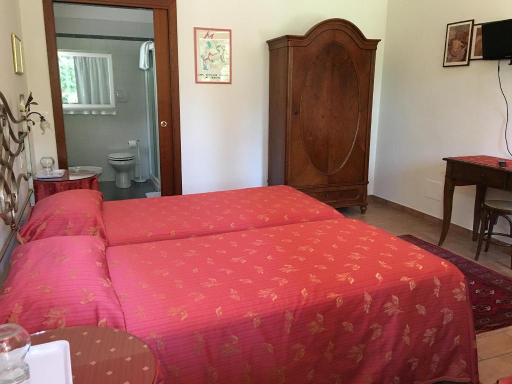 Postel nebo postele na pokoji v ubytování Agriturismo Da Ninoti