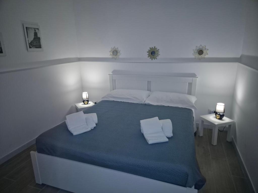 Un pat sau paturi într-o cameră la Mia's Home