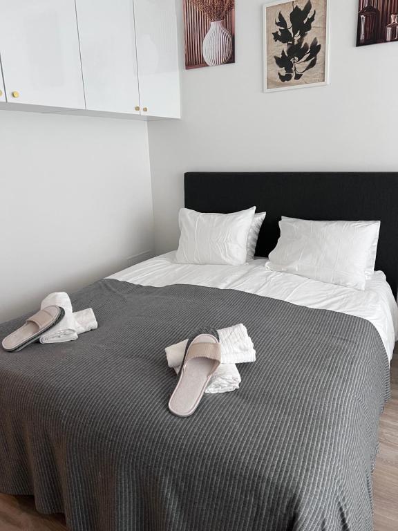 Postel nebo postele na pokoji v ubytování Lamminpää