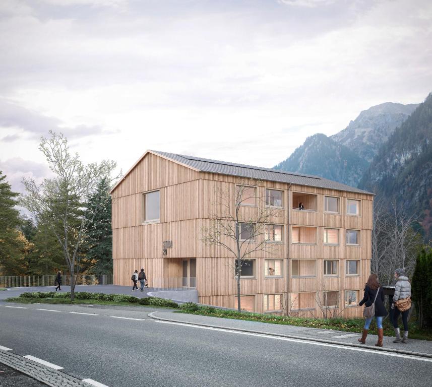 a wooden building on the side of a road at Appartementhaus Studa 29 in Brand