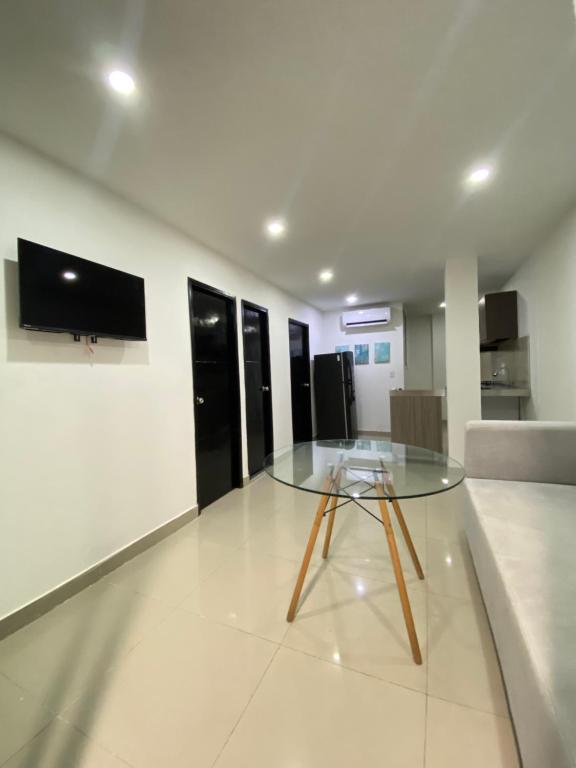 TV a/nebo společenská místnost v ubytování Apartamento para Grupos En La Boquilla BBB