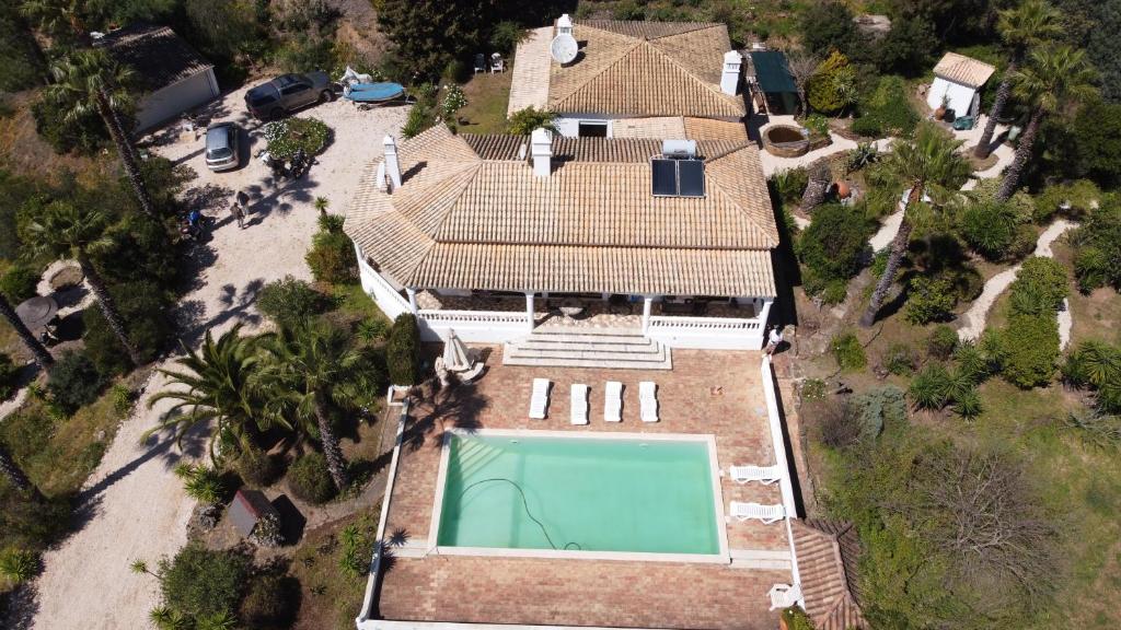 an aerial view of a house with a swimming pool at casa do lago in Monchique
