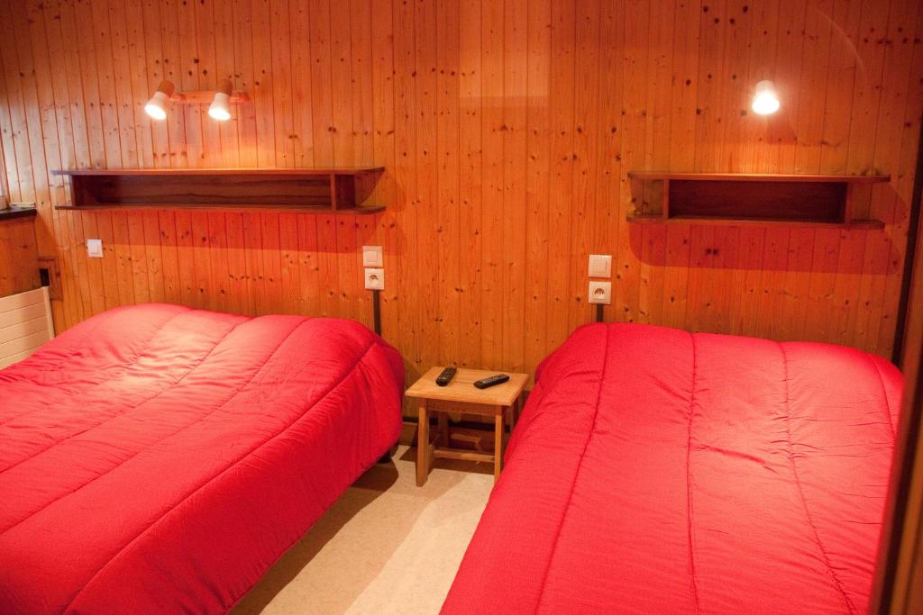 Postel nebo postele na pokoji v ubytování Hébergement Artense