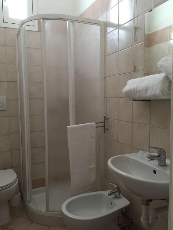 Koupelna v ubytování Hotel Bacco
