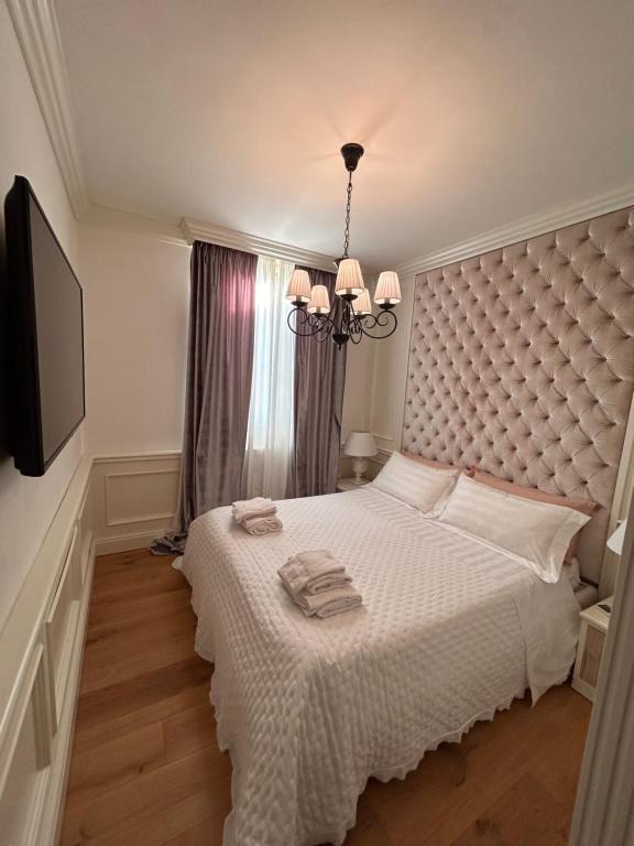 Cama o camas de una habitación en Suite Amendola - Luxury Apartment