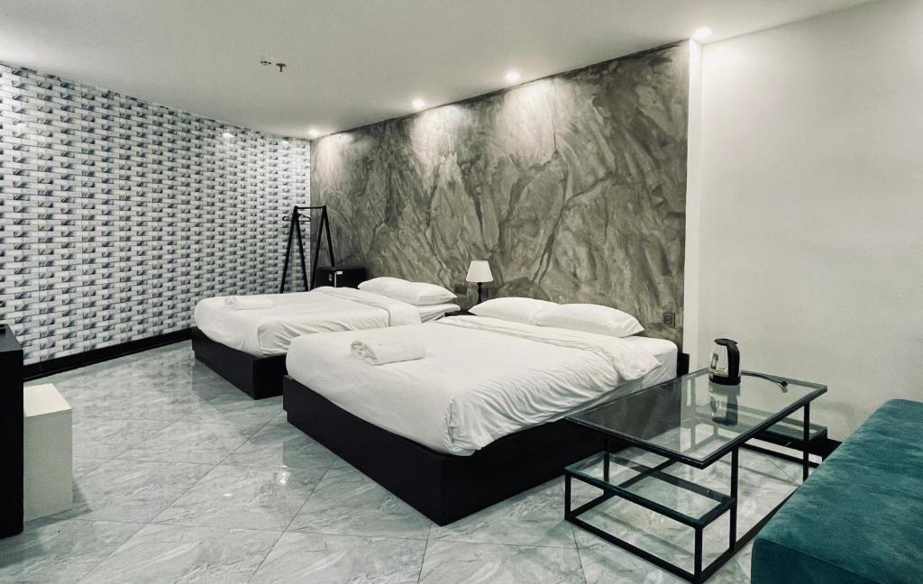 Giường trong phòng chung tại Ben Ben Hotel - Near City Center - Budget Stay