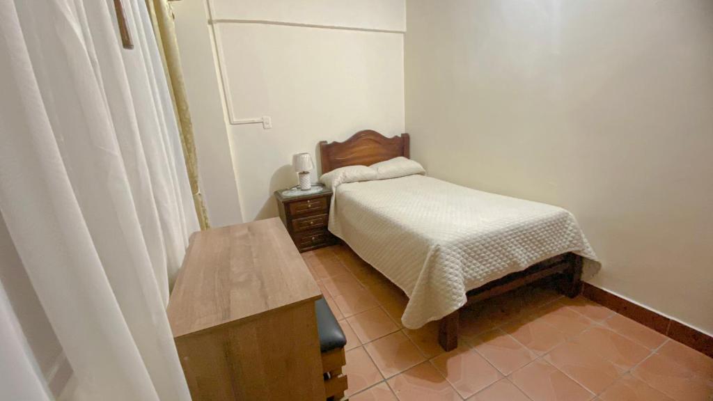 Postel nebo postele na pokoji v ubytování Habitación con baño privado