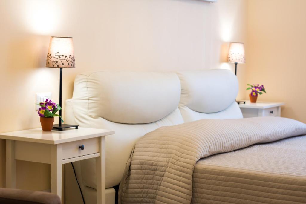 A bed or beds in a room at House Gregorio