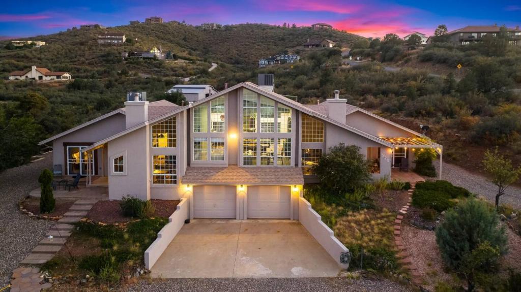 an aerial view of a house with a garage at Lynx Lake Lux 6-br Housesleeps 22hot Tubgame Rm in Prescott