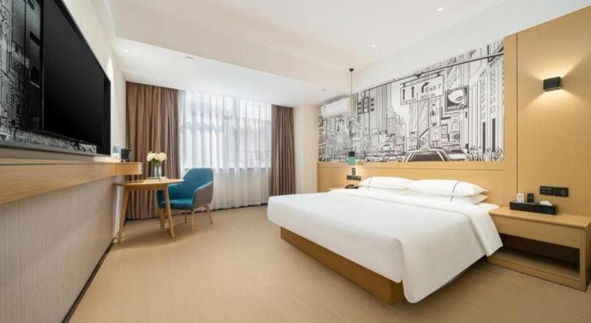 TV a/nebo společenská místnost v ubytování City Comfort Inn Nanning Shuangyong Road Guangxi Medical University