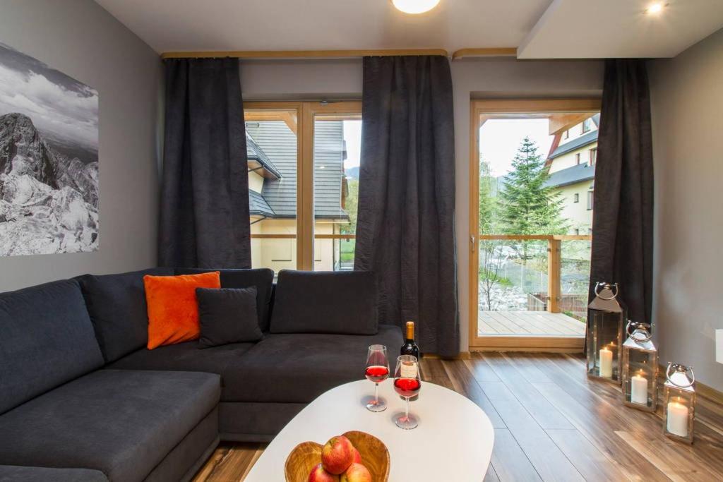 Posedenie v ubytovaní Apartament Ornak