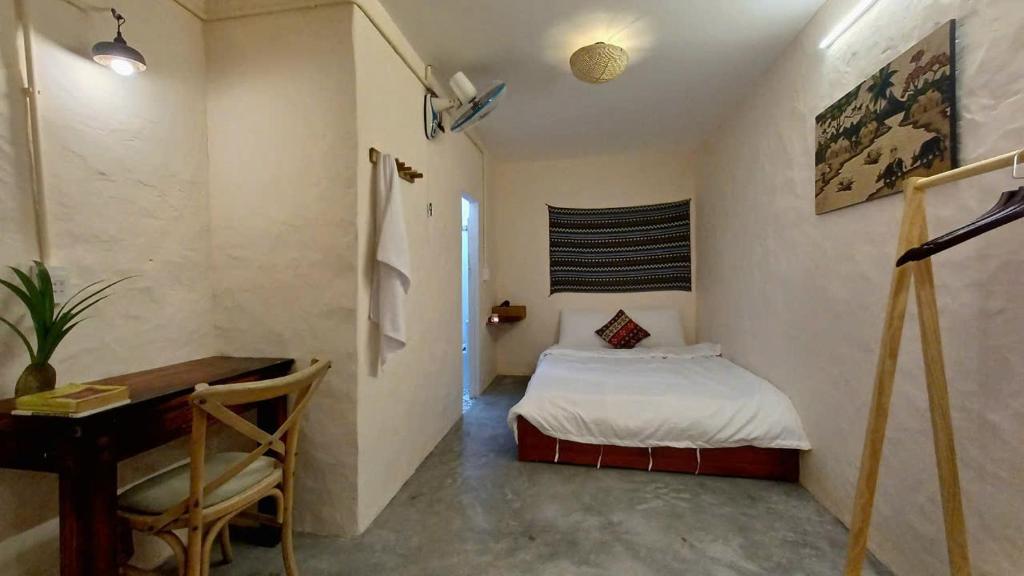 Giường trong phòng chung tại Maidi Homestay Mui Ne