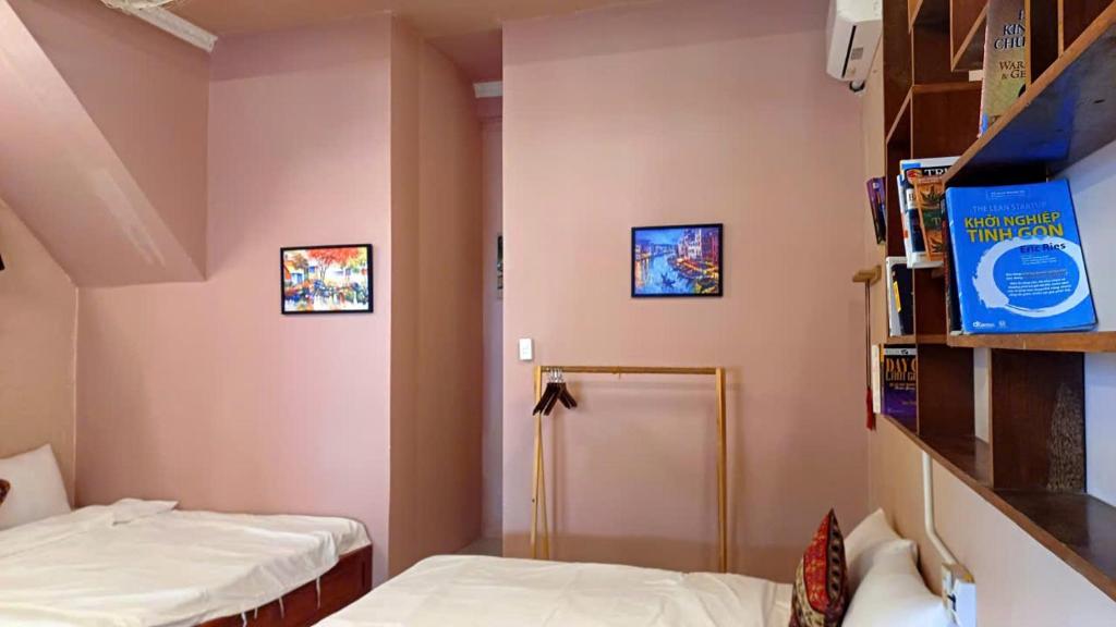 Giường trong phòng chung tại Maidi Homestay Mui Ne